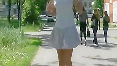 Tall thin blonde walks around in public