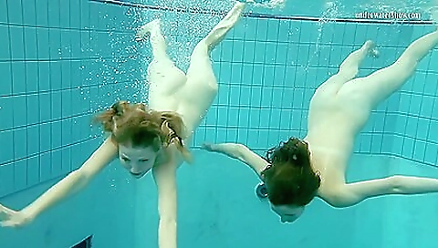 Nastya Undresses Libuse In The Pool Like A Lesbian Nastya Undresses Libuse In The Pool Like A Lesbian