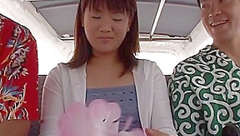 Innocent looking Japanese babe getting some in the backseat Innocent looking Japanese babe getting some in the backseat