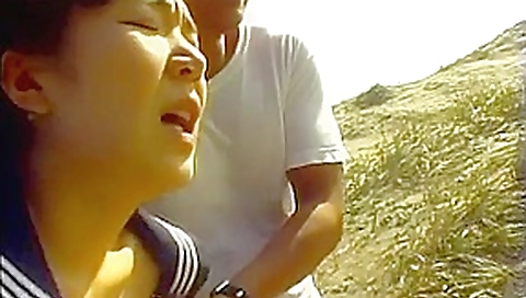 Busty Japanese gal gets things in her wet cunt 