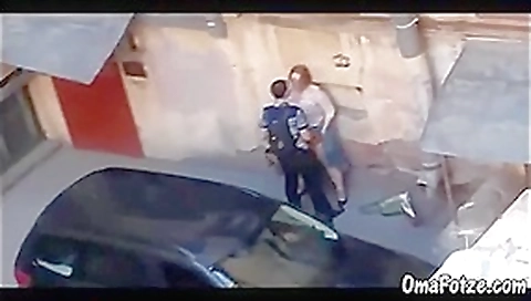 Chubby mature fucks with a man in the parking lot, public sex Chubby mature fucks with a man in the parking lot, public sex